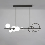 Modern black metal pendant light fixture with spherical glass shades for dining room ceiling light use