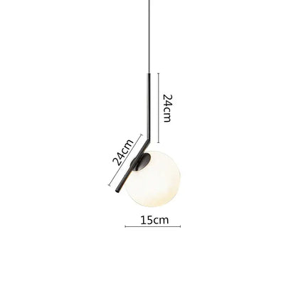 Minimalist black metal pendant light with a frosted glass globe and black metal ring for modern dining room use