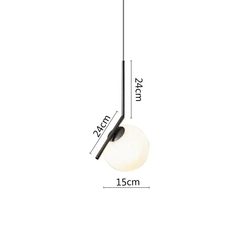 Minimalist black metal pendant light with a frosted glass globe and black metal ring for modern dining room use