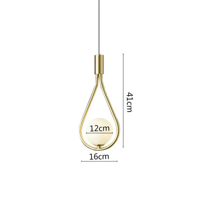 Modern pendant light with a sleek gold-toned frame and opaque white globe complements black metal ring dining decor