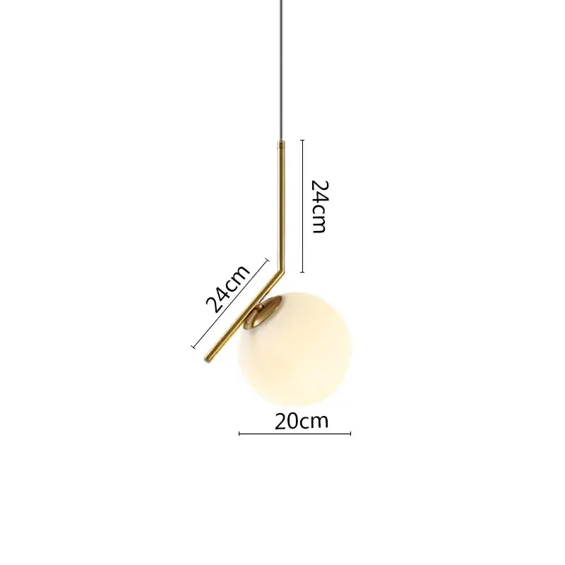 Modern black metal ring pendant light with brass finish, frosted glass globe, and angular metal arm for dining room