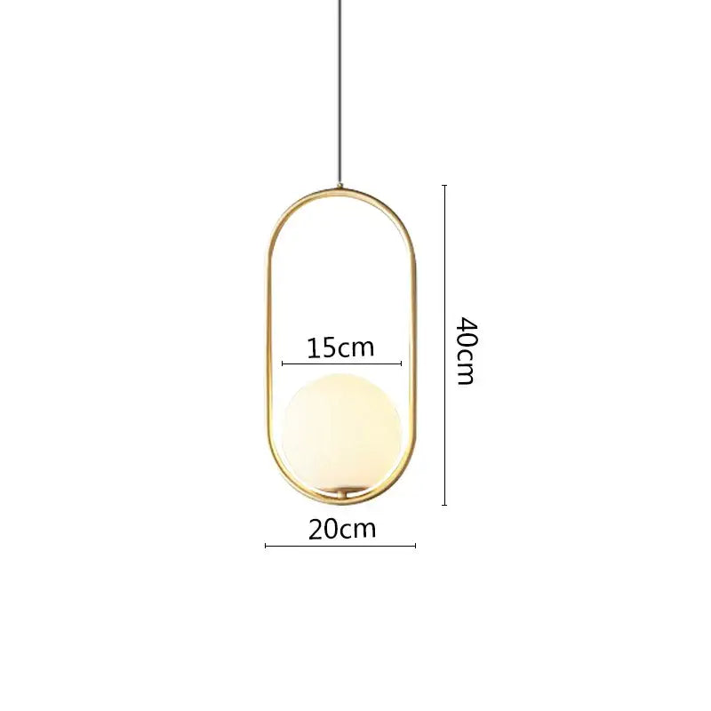 Modern pendant light with gold-toned oval frame and frosted glass globe suspended from black metal ring