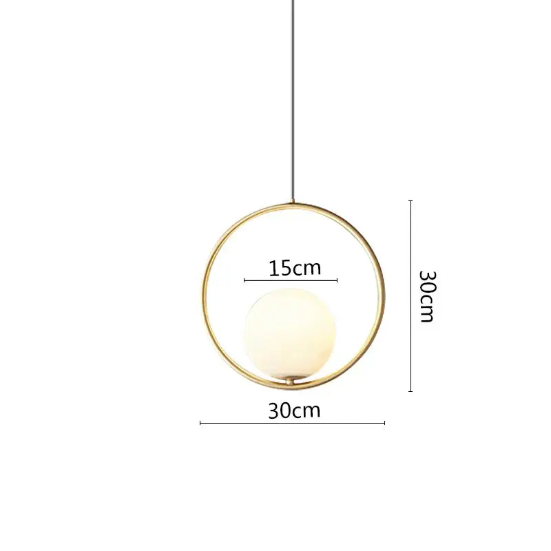 Modern black metal ring pendant light with sleek gold frame and opaque white glass globe for dining room lighting
