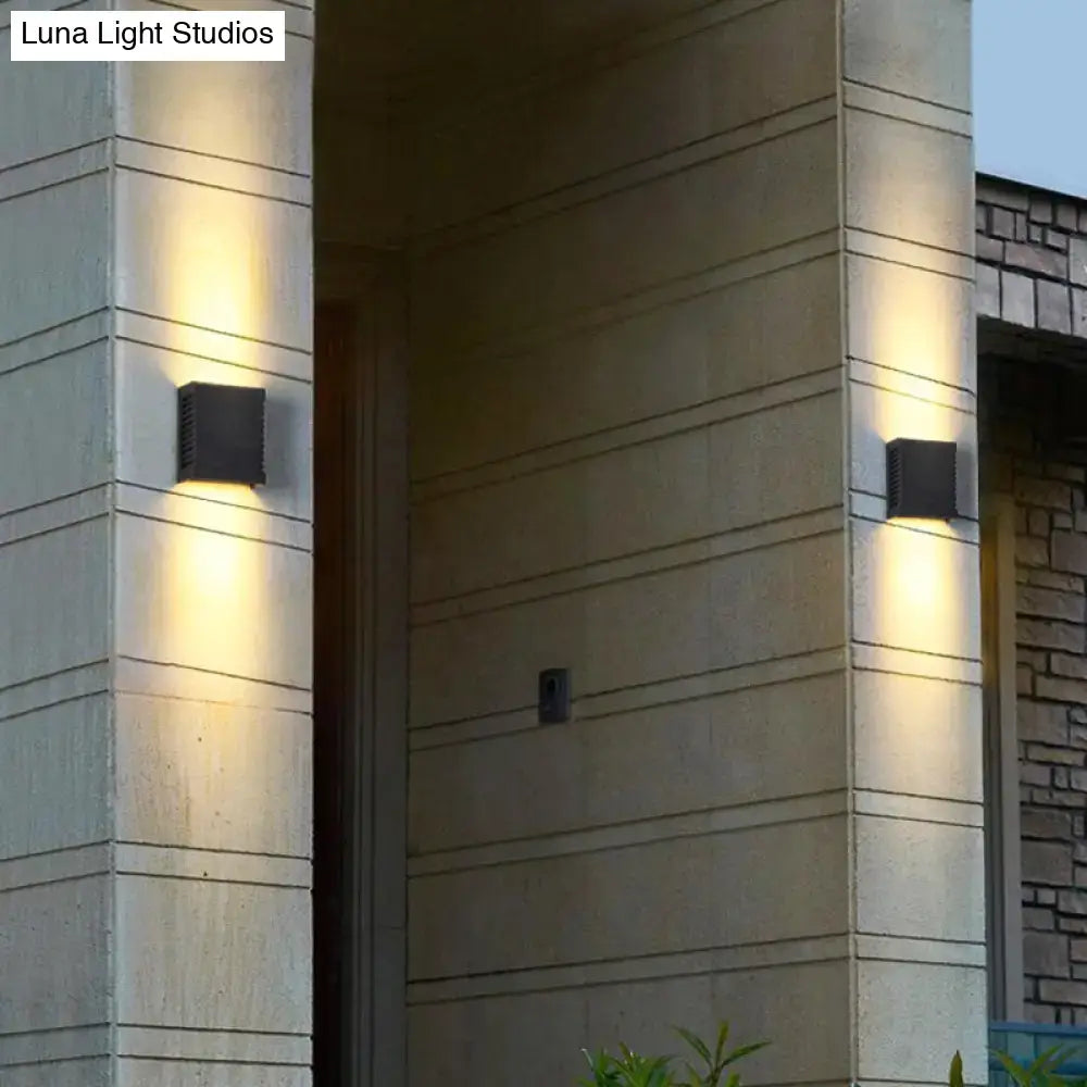 Modern black metal shade wall light garden outdoor sconce with textured surface emitting warm ambient light 220v-240v 110v-120v