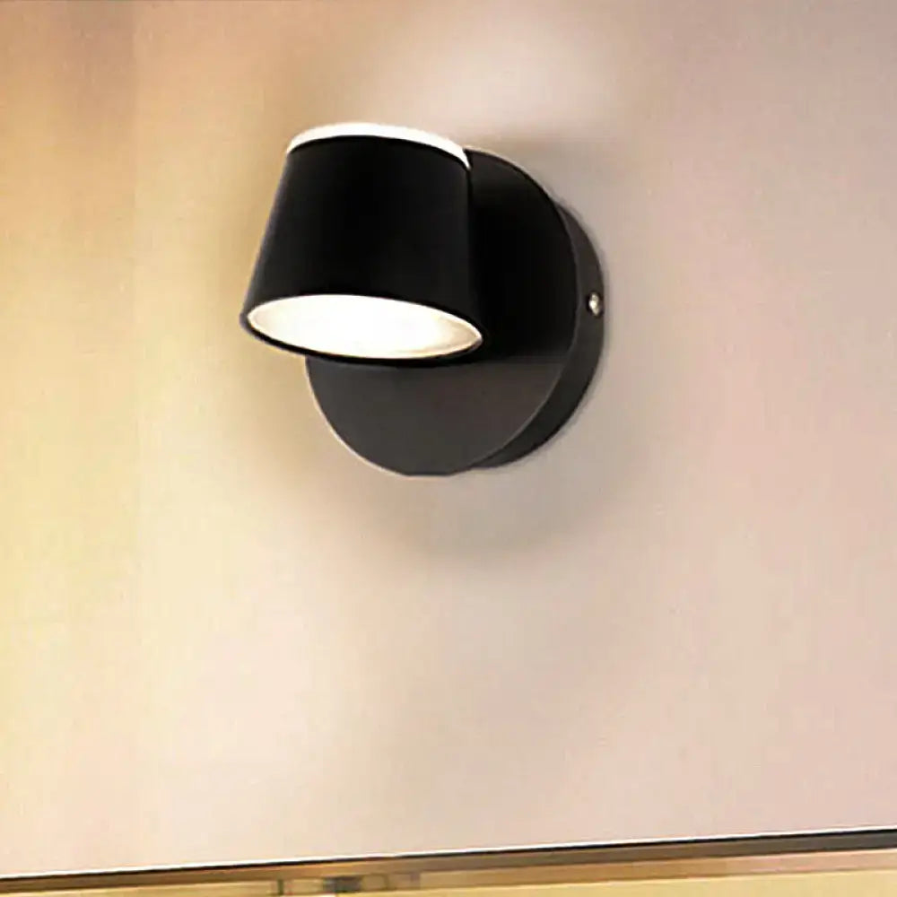 Modern black metal shade wall sconce with white interior and matte finish ideal for bedroom vanity fixture width and shade height