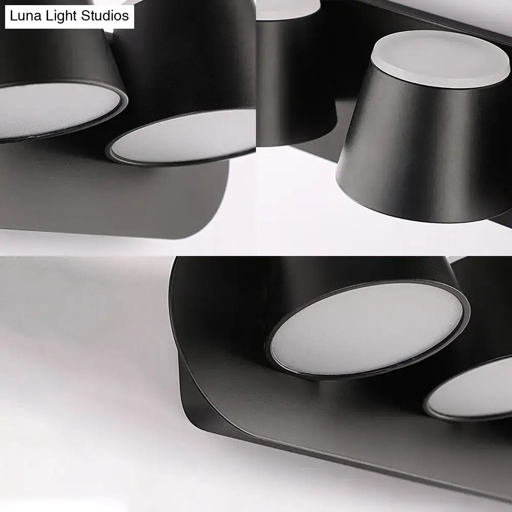 Modern black metal shade wall sconce with matte finish and integrated white led panels for bedroom vanity fixture