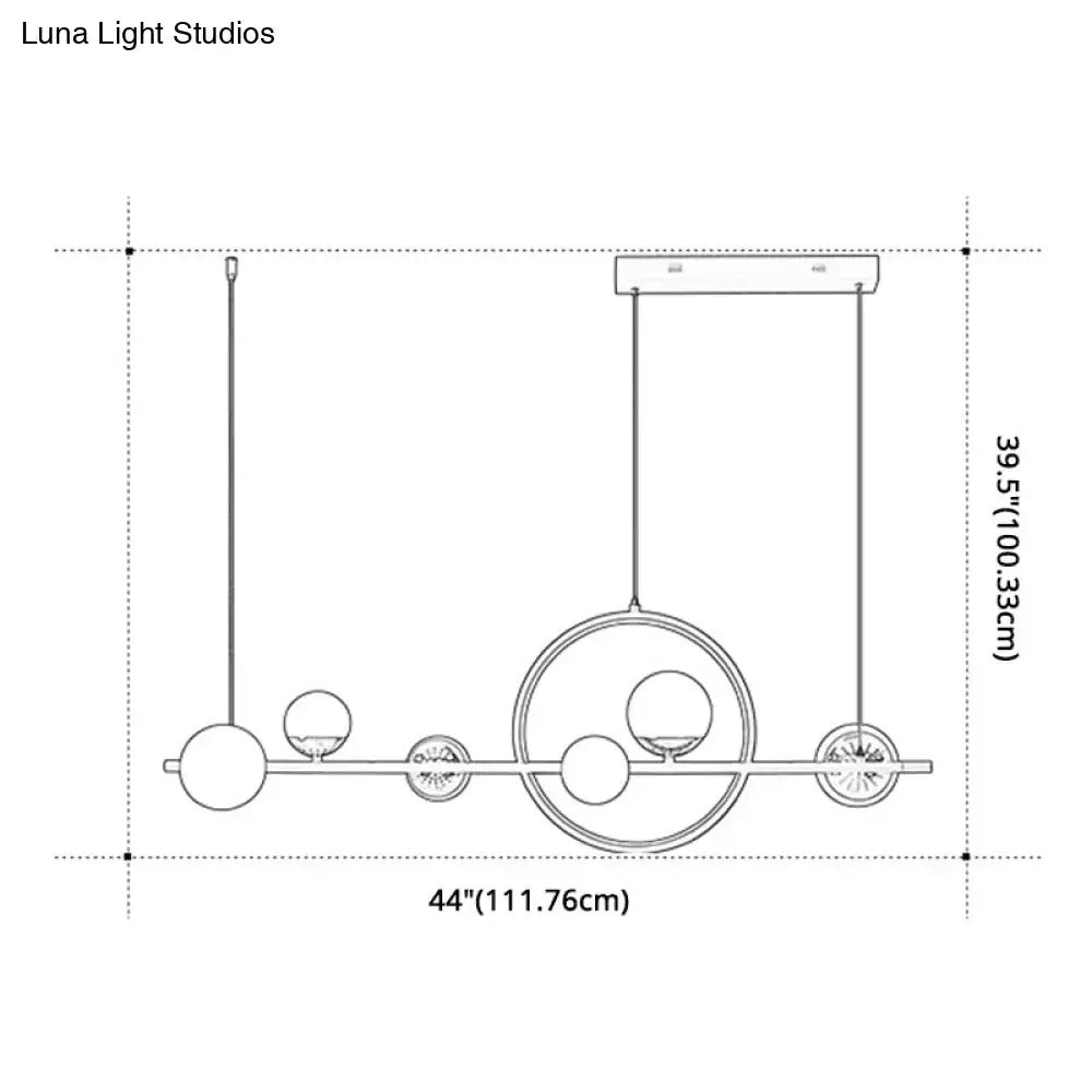 Modern black metal pendant light with spherical glass elements and circular accents for dining room lighting