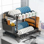 Modern black metal two tier dish drainer rack with integrated utensil holder and cutting board slot kitchen organizer