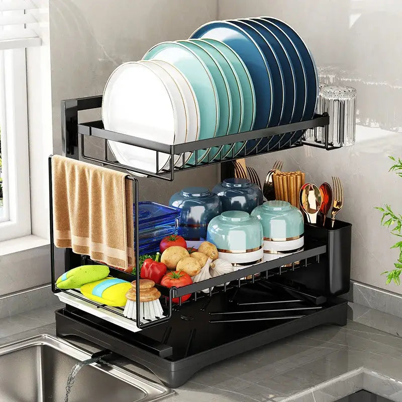 Modern black metal two tier dish drying rack with towel holder neatly organizing dishes utensils and produce