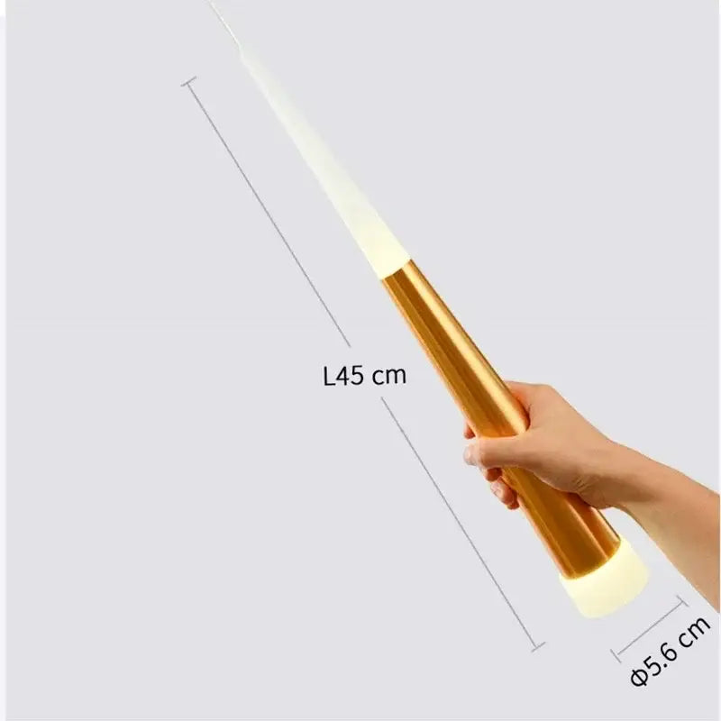 A sleek golden-finished led torch with glowing ends showcased alongside decorbites black meteor shower crystal chandelier