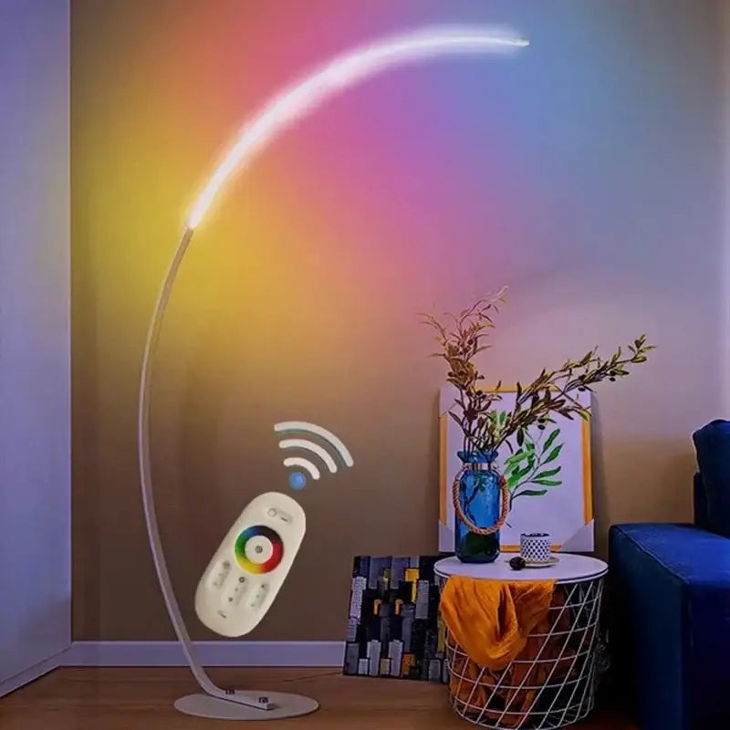 A sleek white arc floor lamp with vibrant rainbow led lighting for modern dimmable living room use