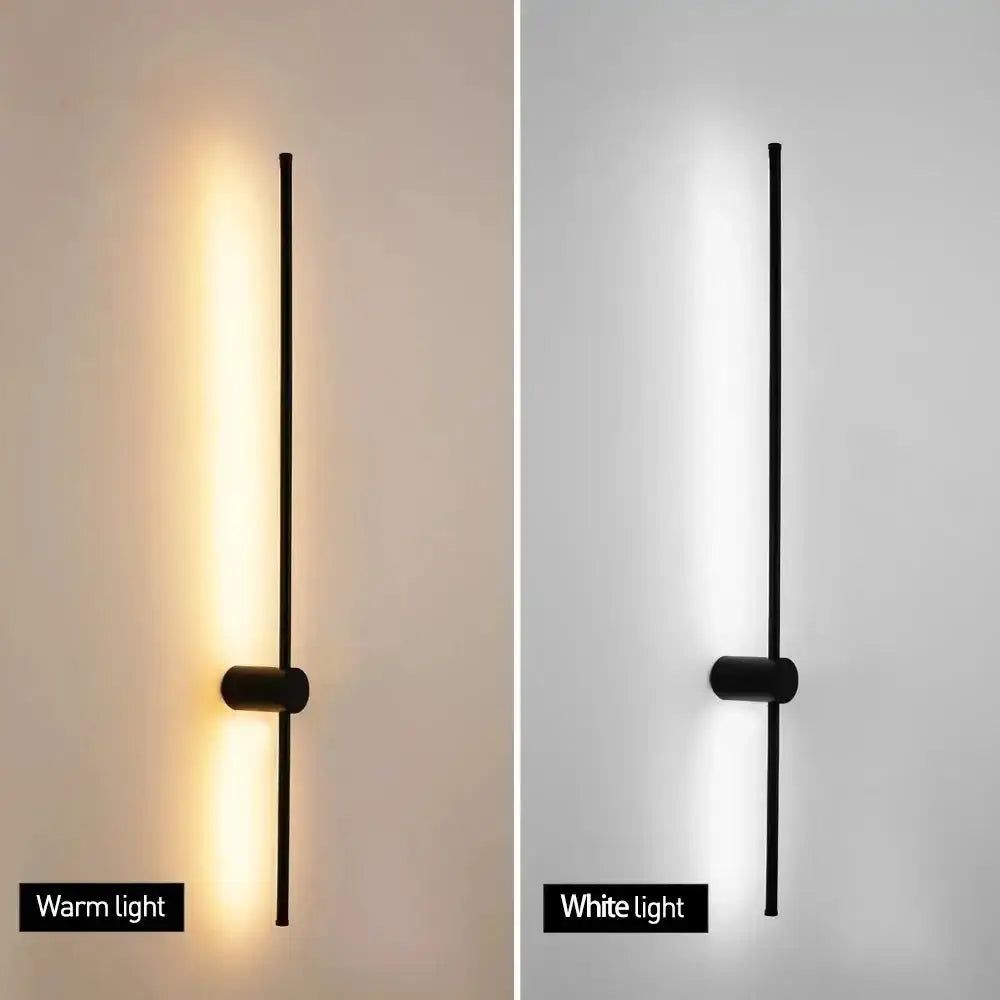 Modern black minimalist decorbites led strip wall lamp with sleek vertical bar and cylindrical base for staircase lighting