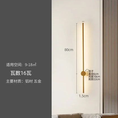A sleek gold-toned minimalist wall lamp with cylindrical stem and circular base from decorbites led strip collection