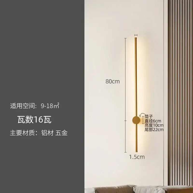 A sleek gold-toned minimalist wall lamp with cylindrical stem and circular base from decorbites led strip collection