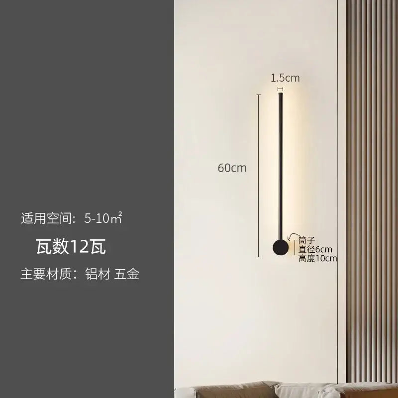 A sleek black wall lamp with a slender 60cm rod and round base decorbites led strip for modern minimalist decor