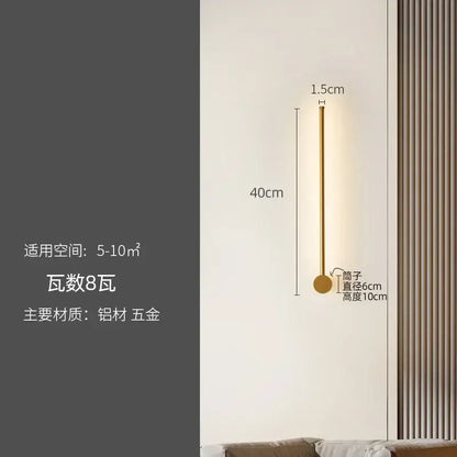 A sleek modern gold-toned wall lamp with a slender stem and round base for decorbites led strip staircase lighting