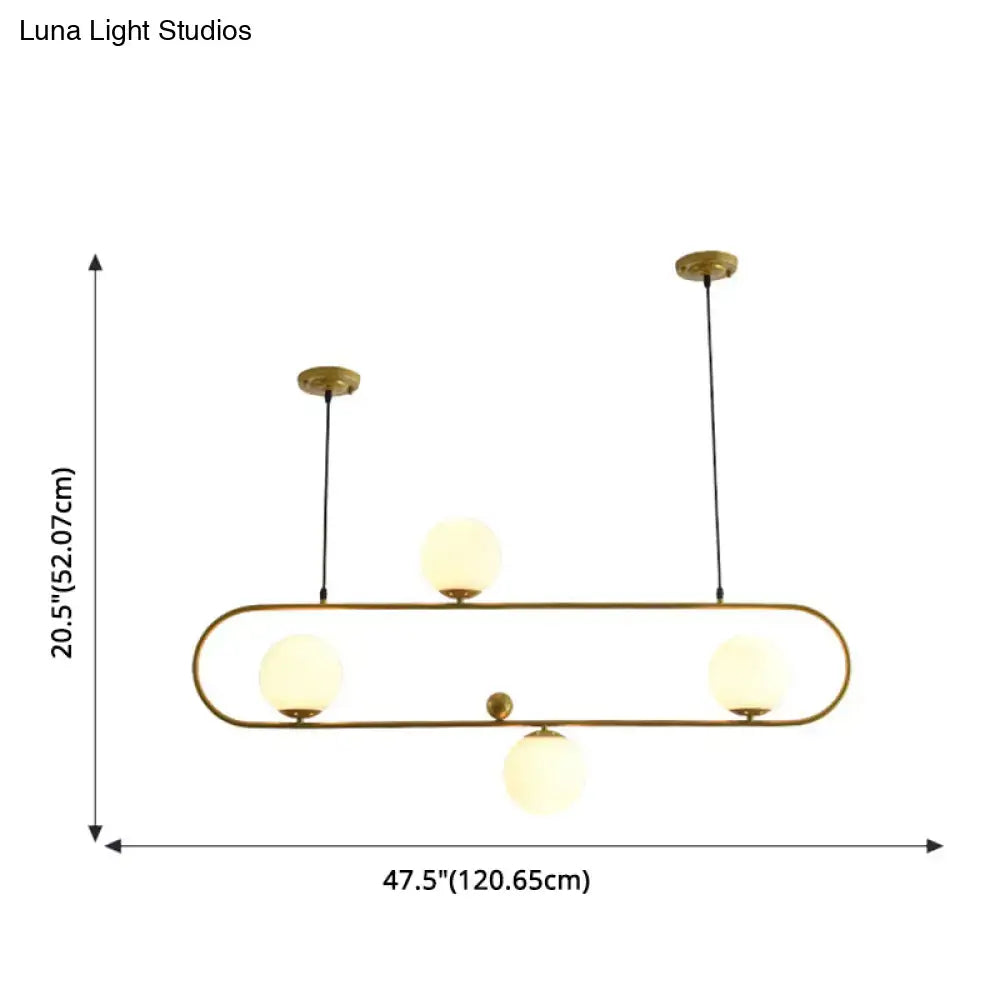 Modern black minimalist ellipse ceiling light with brass finish and four frosted glass globes for living room use