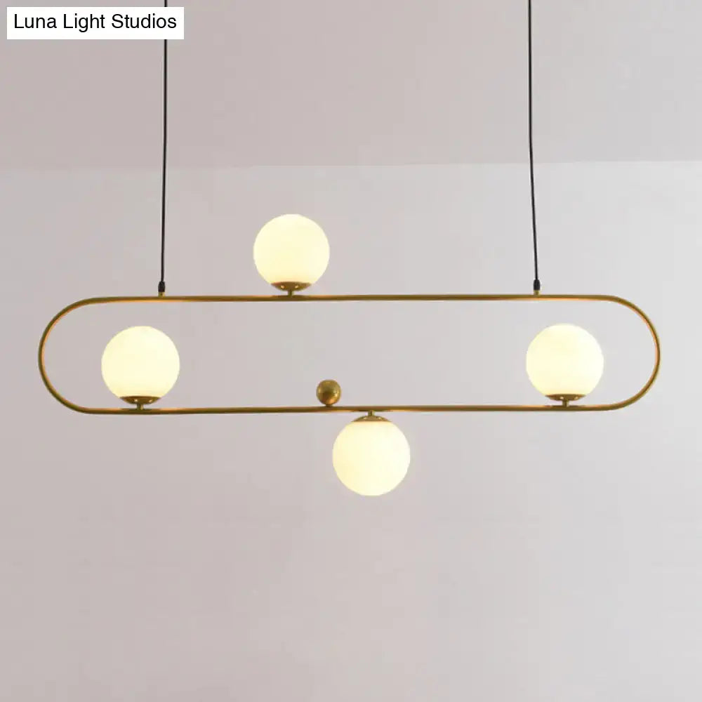 Modern black minimalist ellipse ceiling light with brass finish and four frosted glass globes for living room ceiling light