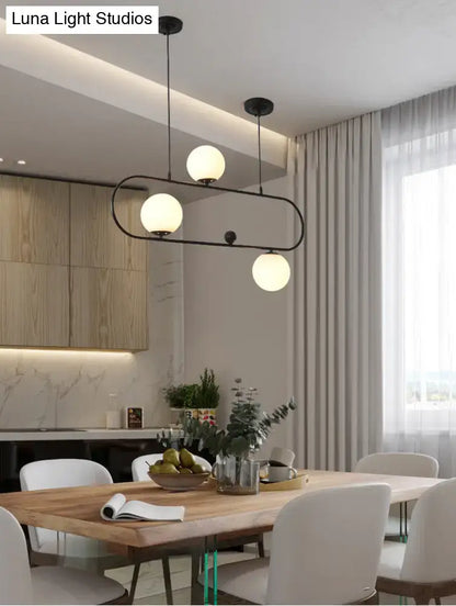 Modern black metal minimalist ellipse ceiling light with three frosted white globes for living room use