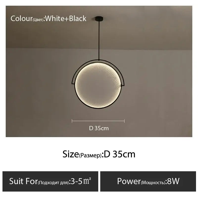 A modern black and white circular led pendant light with sleek minimalist design for living room use