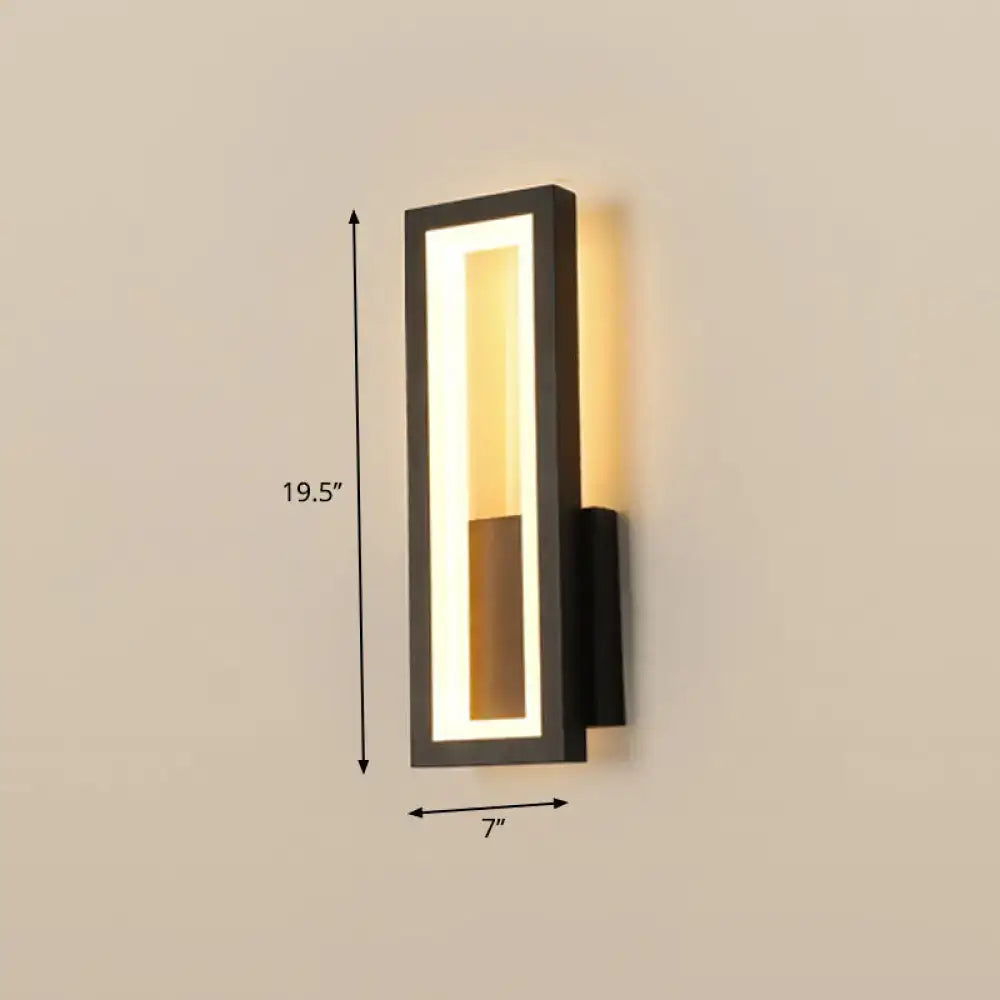 Modern black minimalist led wall sconce with rectangular design and warm white vertical light for foyer lighting