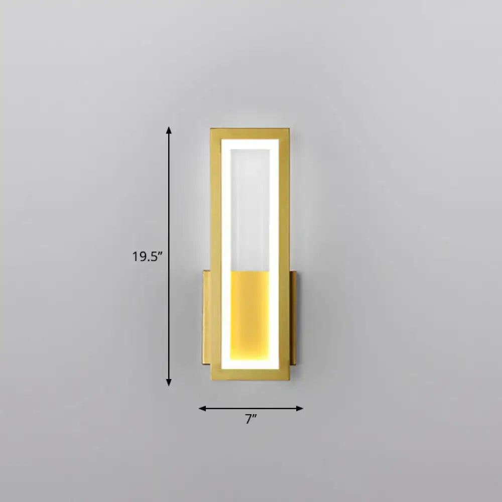 Modern black minimalist wall sconce with gold frame and glowing white amber led light panel for foyer lighting