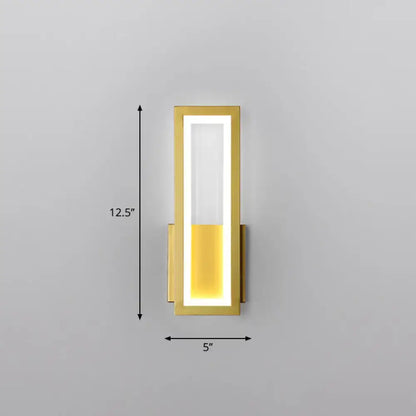 Modern black minimalist wall sconce with gold finish rectangular led panel emitting warm yellow foyer light