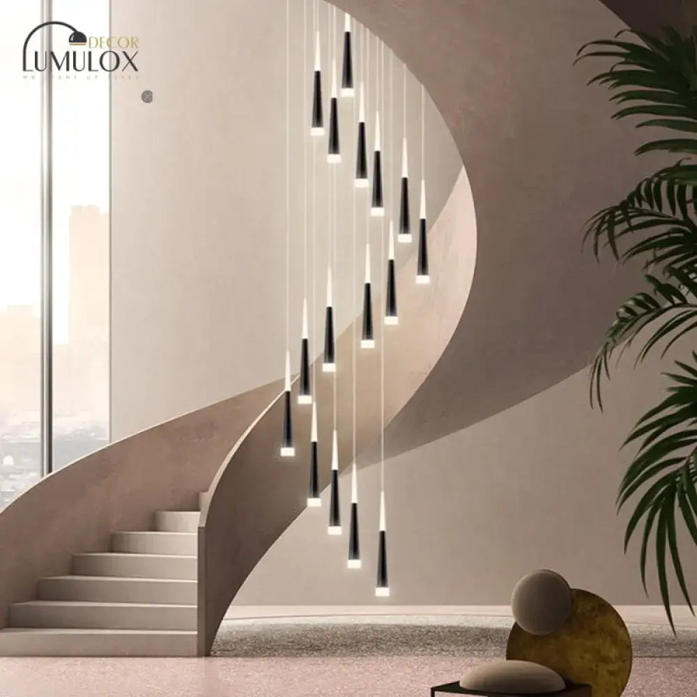 Modern black and white minimalist metallic multi ceiling light with acrylic shade hanging above curved staircase