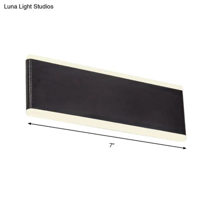 Modern black minimalist rectangle wall light fixture with black and cream magnetic strip designed for dining room use