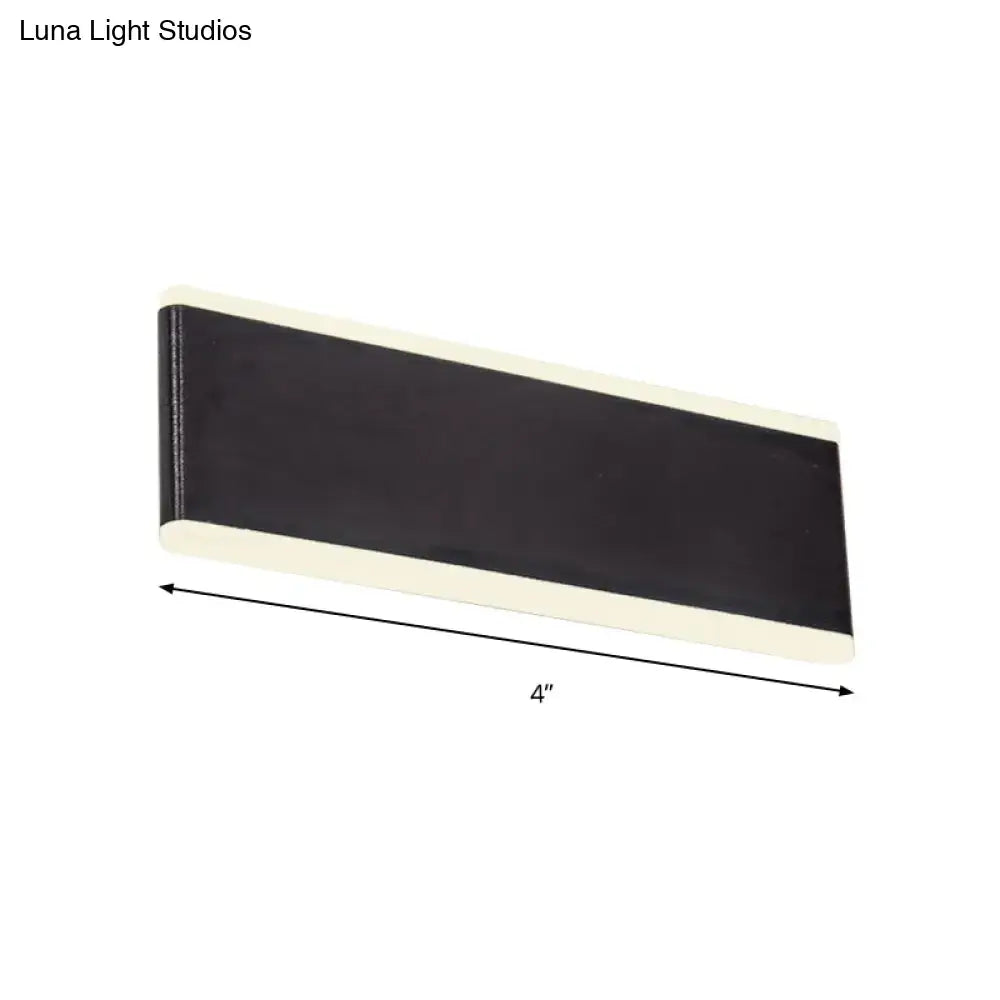 Modern black and cream rectangular wall light fixture with sleek design and maximum bulb wattage for dining room use