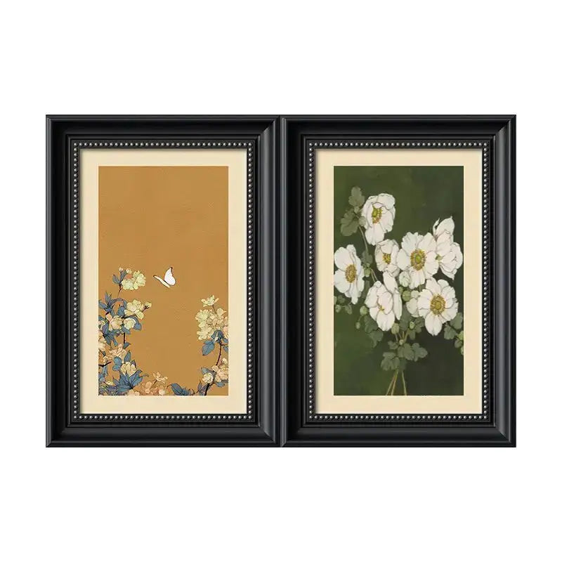 Modern black mirror electric meter box cover with decorative painting of black-framed botanical prints and butterfly