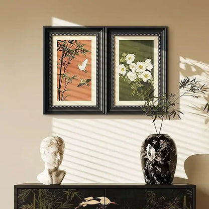 Modern black ceramic vase with white floral and bird patterns used as a decorative painting for electric meter box cover