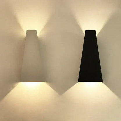 Two minimalist black and off-white led wall lamps with sleek geometric design emit warm glow for bedroom decorbites dual head