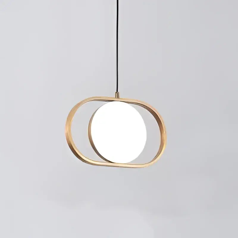 Modern black oval adjustable angle pendant light with warm brass frame and glowing circular glass panel for kitchen decorbites adjustable angle pendant