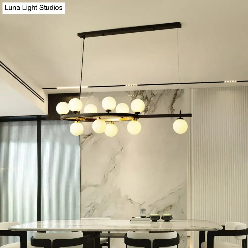 Modern black metal oval hanging light fixture chandelier with twelve frosted glass globe lights for dining room use