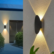 Modern black oval led outdoor porch wall light by decorbites with warm focused lighting for garden sconce decor