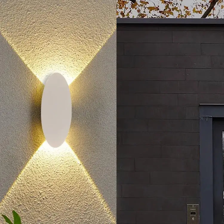 Modern black oval led outdoor porch wall light with sleek white finish and warm directional lighting by decorbites led outdoor
