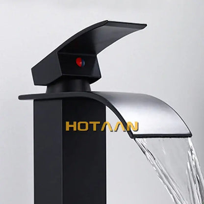 Modern black plated brass waterfall basin tap featuring black matte finish and brushed chrome spout for bathroom use