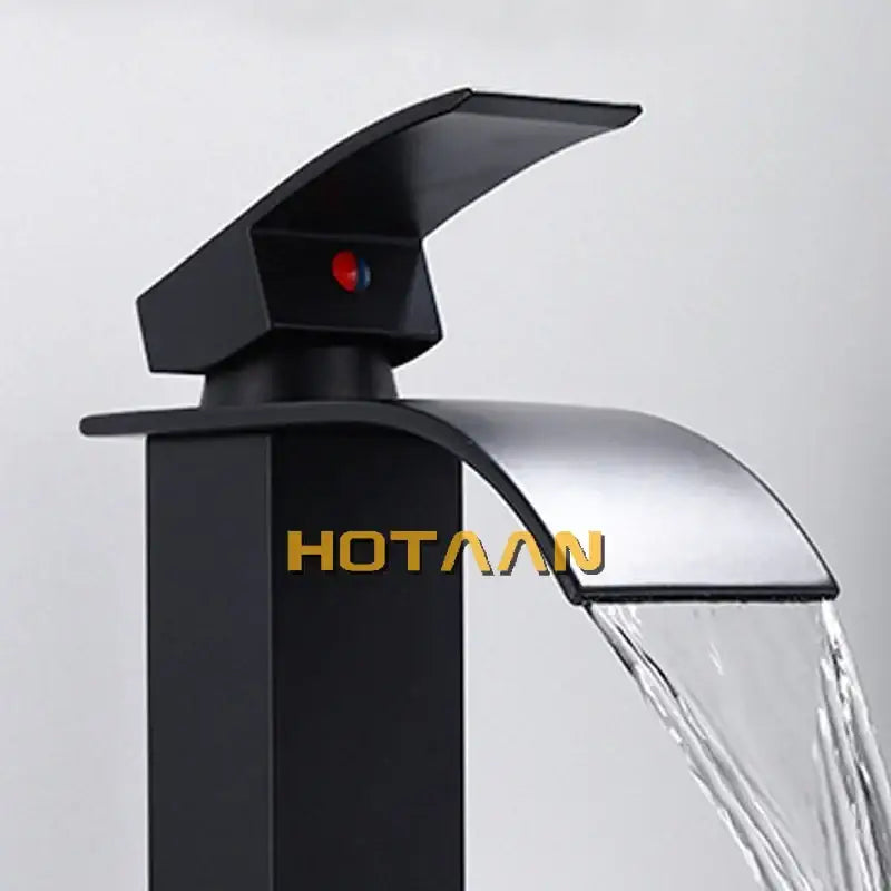 Modern black plated brass waterfall basin tap featuring black matte finish and brushed chrome spout for bathroom use