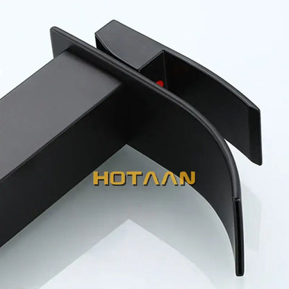 Modern black plated brass bathroom mixer with sleek black matte-finished car door handle trim and subtle red accent