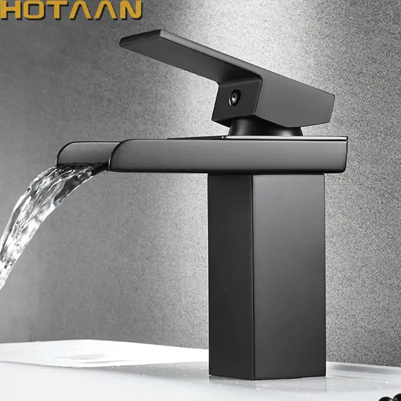 Modern black plated brass waterfall faucet with a matte finish and angular design for bathroom sink mixer