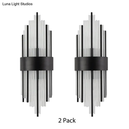 Modern black prism crystal wall light featuring clear glass tube sconces for stylish living room lighting