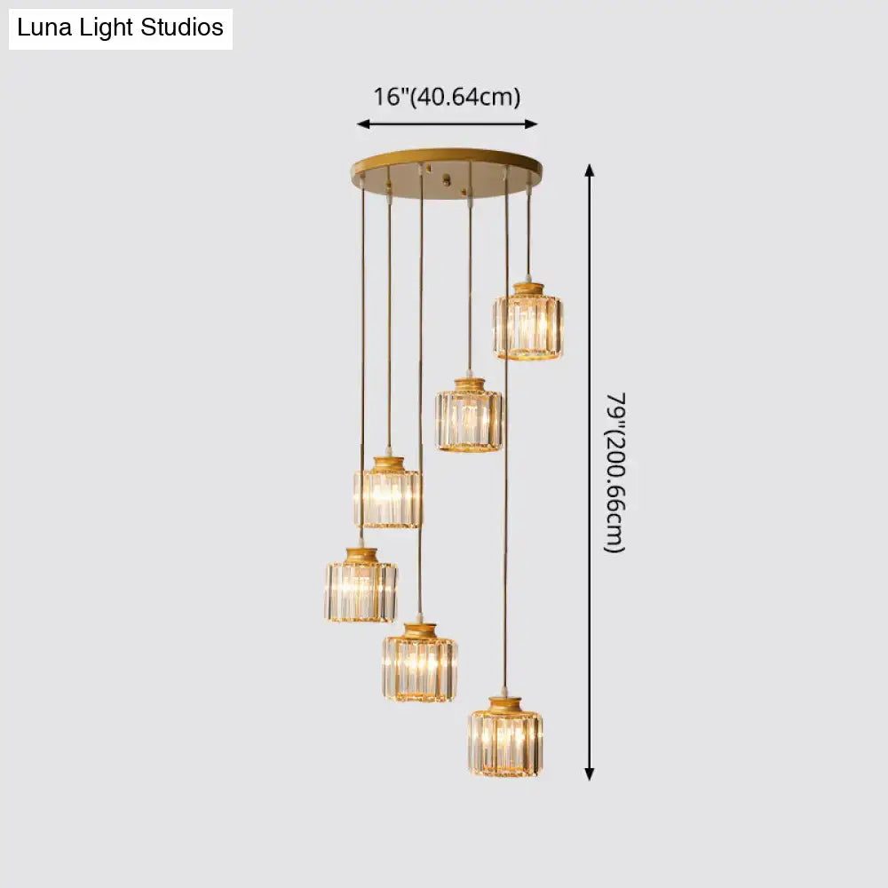 Gold-toned DecorBites™ modern prismatic crystal cylindrical pendant ceiling light with five crystal glass shades for stairway
