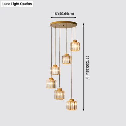 Gold-toned DecorBites™ modern prismatic crystal cylindrical pendant ceiling light with five crystal glass shades for stairway