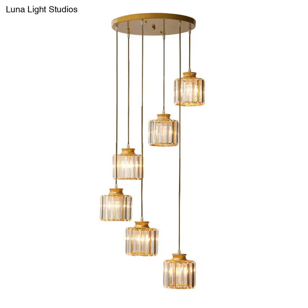 Gold-toned DecorBites™ modern prismatic crystal cylindrical pendant chandelier with five faceted glass shades for stairway