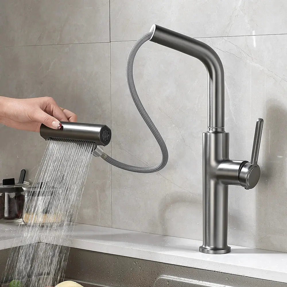 Modern black pull kitchen faucet by decorbites features a matte finish with a flexible pull-out spray and waterfall stream