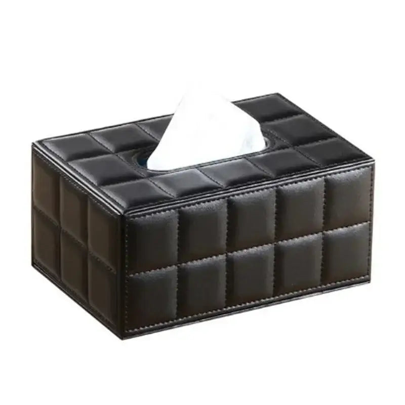 Modern black quilted leather tissue box holder with square grid pattern and stitched edges for office and home use