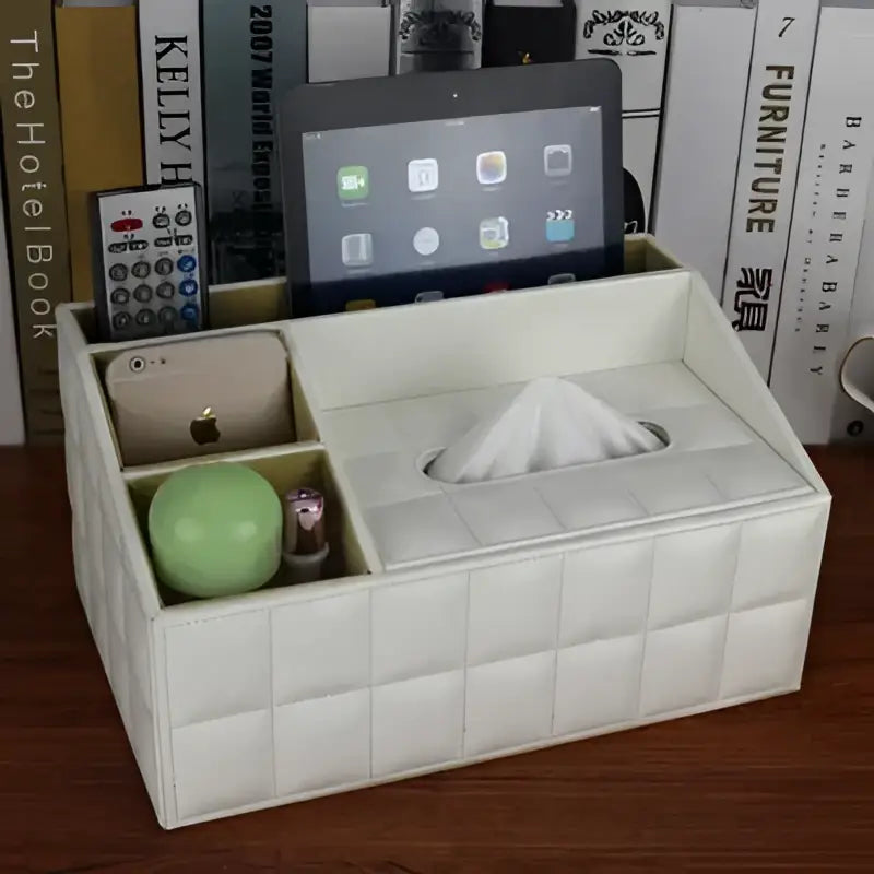 Modern black quilted leather tissue box holder with organizer compartments holding tablet phone remote and tissues