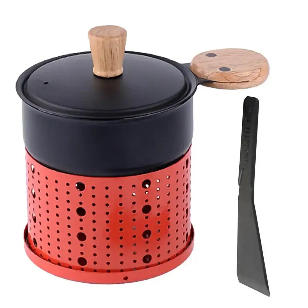 Modern black raclette fondue set with red perforated metal camping stove black lid and wooden handles for dining table use