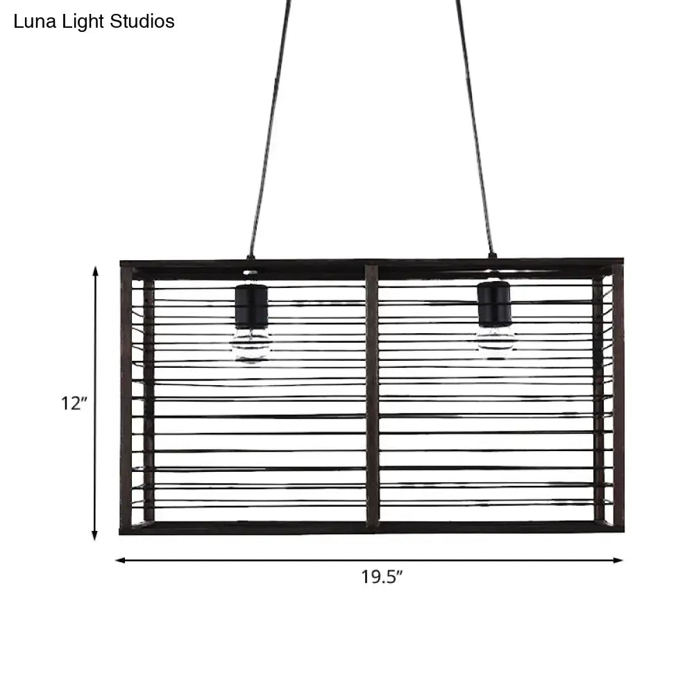 Black metal rectangle cage pendant light with horizontal slats and two exposed bulbs for island lighting